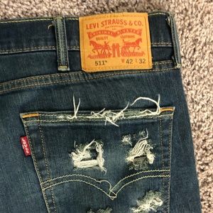 Levi 511 ripped jeans